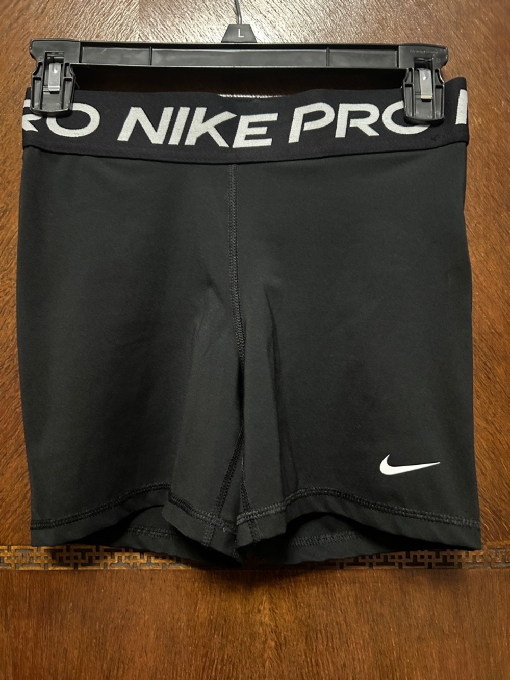 Nike Pro Women's training black shorts. Tight, stretchy, sweat-wicking fabric